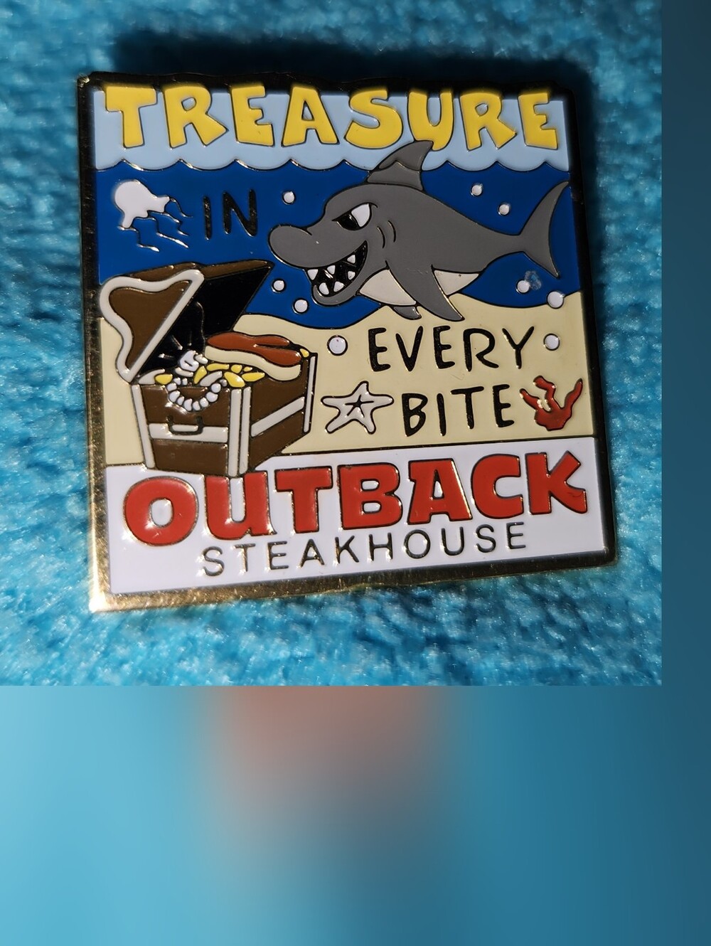 Outback Steakhouse Flare Treasure Every Bite Enamel Pin - Blue, Yellow, Red